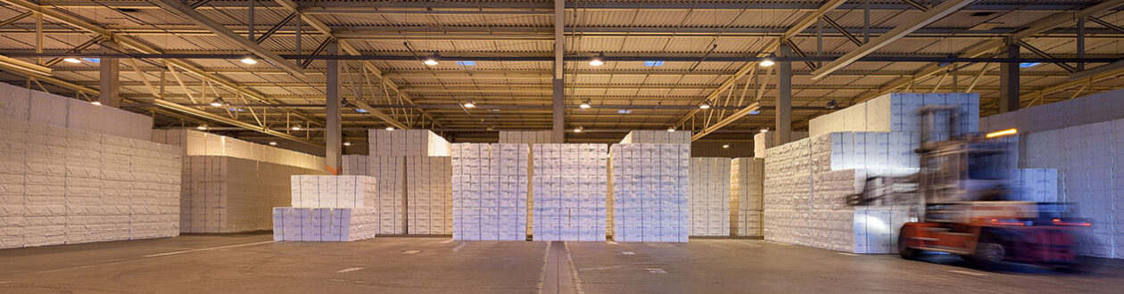 Mercer Rosenthal pulp mill warehouse, forklift stacking bales