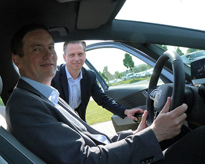Managing Director André Listemann test drives new ID.3 electric vehicle at the Mercer Stendal pulp mill in Arneburg, Germany, that will be powered by the green stations at the mill