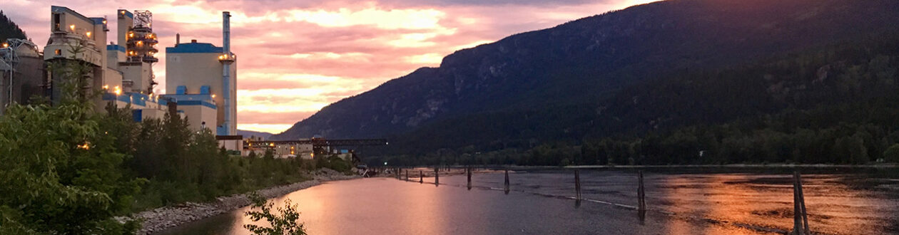 View of the Mercer Celgar mill at sunset overlooking the Nelson River in British Columbia, Canada