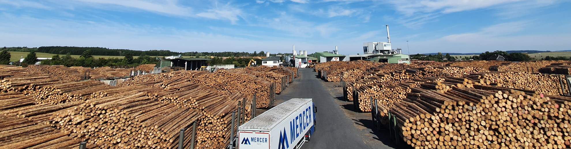 Aerial view of a lorry driving onto the premises of the sawmill in Friesau.